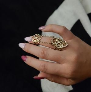 Two piece chain gold painted ring